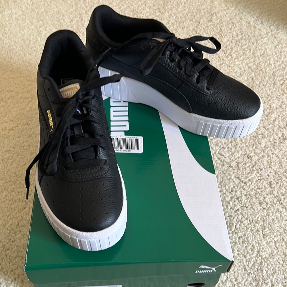 Puma Cali Wedge Sneaker. Black 8.5. Never been worn. Leather upper. With box